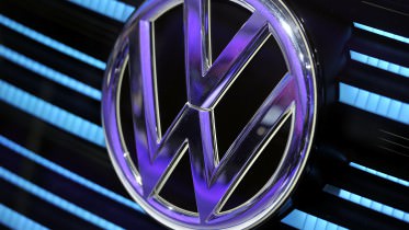Volkswagen logo is displayed at Geneva Motor Show