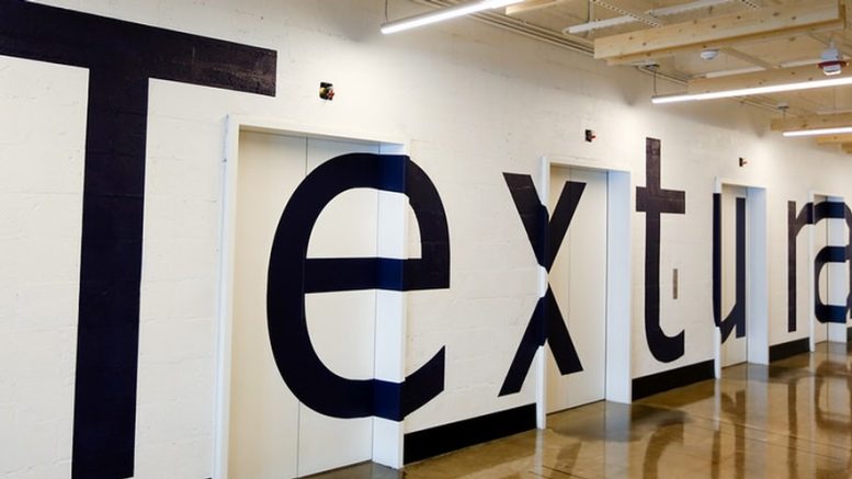 Textura name painted on wall
