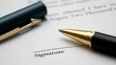 pen signing legal document