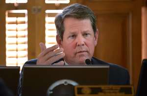 Brian Kemp accuses Obama administration of hyping hacking threat photo
